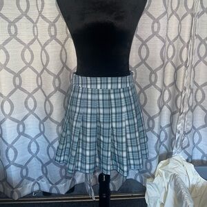 Blue plaid pleated mini skirt